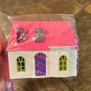 Little dollhouse and toys